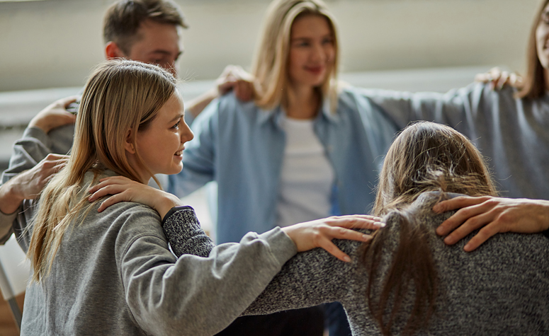 recovery-group-comforting-women Alcoholics Anonymous group comforting relapsed women