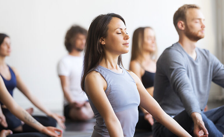 Group meditation class as part of addiction recovery therapy