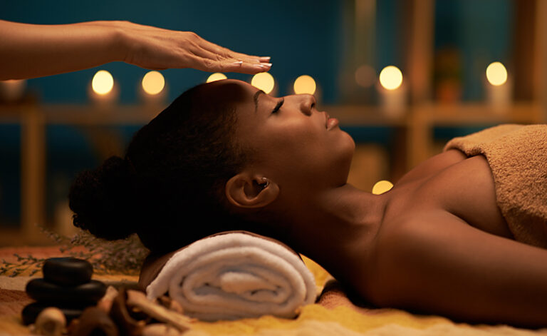 Woman in Reiki therapy session