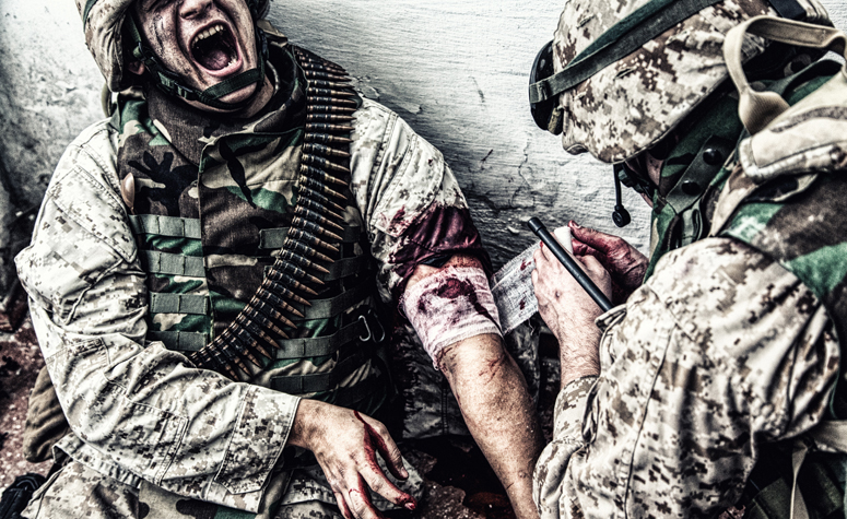 Soldiers in battle facing traumatic events which can lead to PTSD